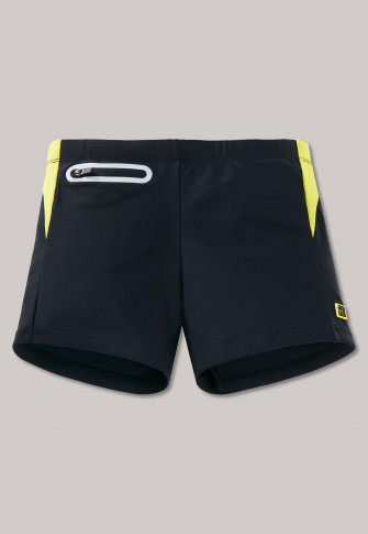 yellow and black swim trunks
