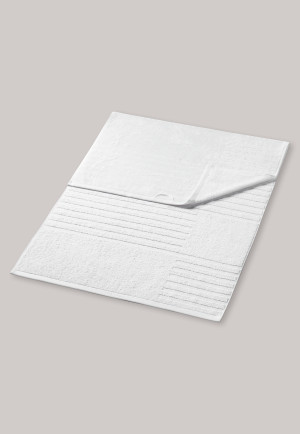 Serviette de douche blanche et texturée de 70 x 140 cm